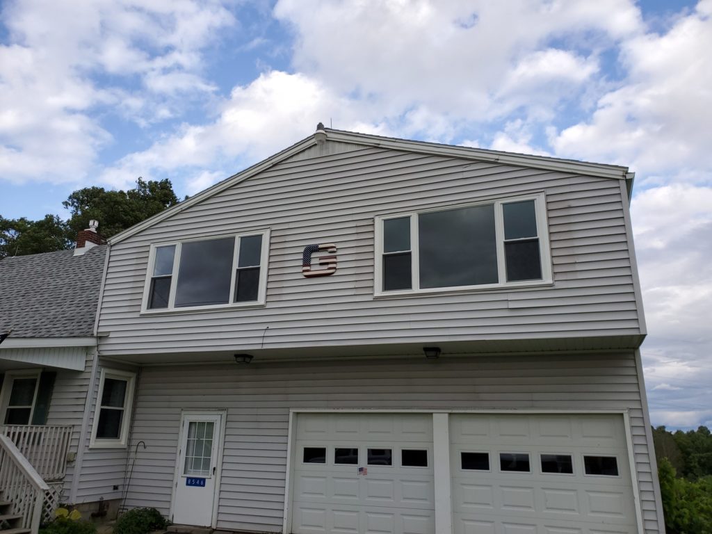 This week, we made a visit to one of our past customers in Holland Patent, NY. She completed some of her windows and gutters with us over the years and wanted to finish up her home with 2 beautiful picture windows! These windows will not only compliment her home, but let more organic light in!