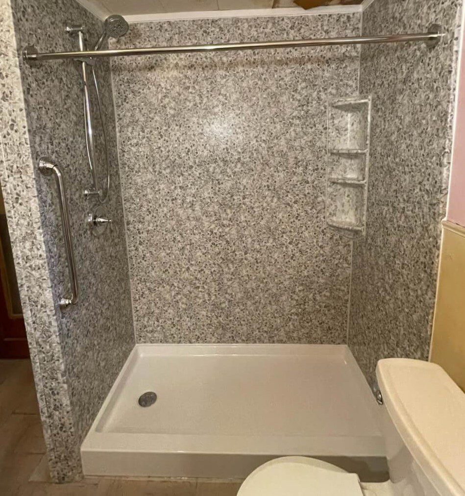 New shower conversion complete with fixtures and accessories.